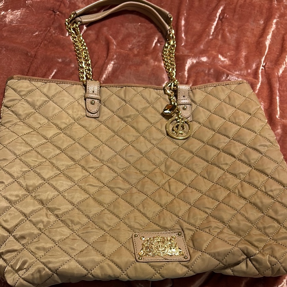 Juicy couture Chic Quilted Tan tote Bag with Gold Accents and bag charm.